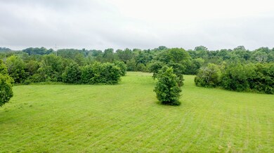 The back of the property goes into the woods Great for Hunting or Make your own Riding Trails.