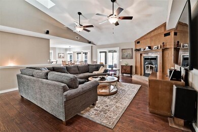 All new flooring, light fixtures and paint.  Lots of recessed lighting.  Light, open and airy. Views of the lake from every room.