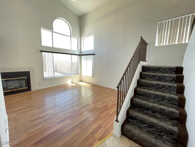Unfurnished living room with wood finished floors,