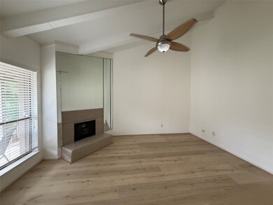 Spacious living room with vaulted ceilings and fir