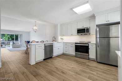 7767 Jewel Ln unit 203, Naples, FL 34109 - photo 2