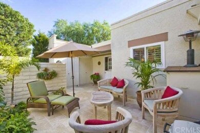 Impressive patio is clad in French Pattern Crema T