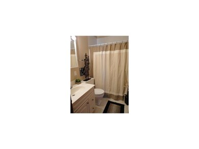Bathroom. Main hall bath is spacious, has newer vi