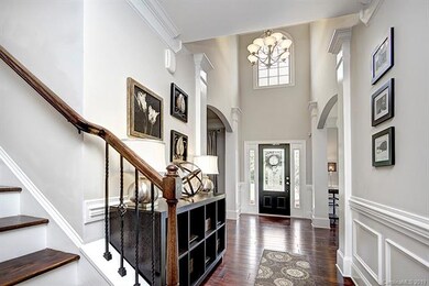 Inviting Two Story Foyer with lots of light