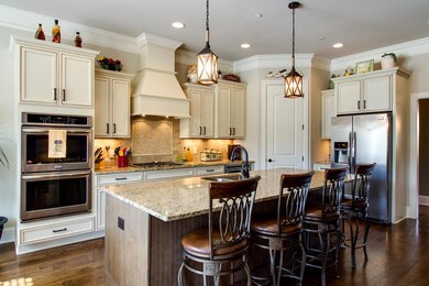 Gourmet Kitchen with HUGE Granite Island, Double Ovens, Pantry, Gas Stove Top