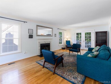 HW floors, fireplace, french doors to deck.