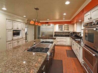 GRANITE COUNTERS, VIKING STOVE TOP, DOUBLE OVENS, 