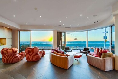 Ocean Front living room with floor to ceiling retr