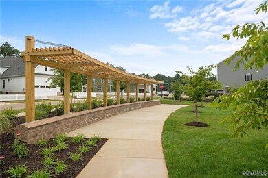 View of property's community with a pergola and a