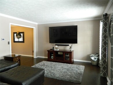 Spaciously appointed Living Room w/laminate floor*