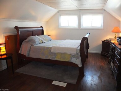 Master bedroom with pine hardwood floors on the 2n
