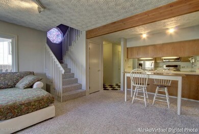 View toward kitchen and stairs