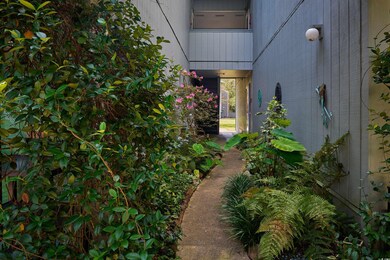 Doorway to property with a balcony