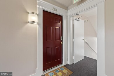 8901 Stone Creek Place unit 204, Pikesville, MD 21208 - photo 2