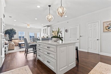 Kitchen featuring a kitchen island, a breakfast ba