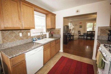 Galley style kitchen with granite countertops and 
