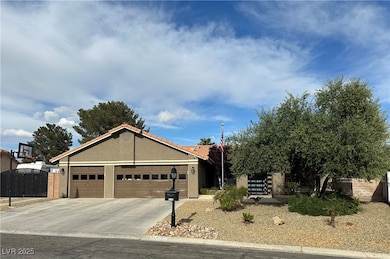 View of front featuring an RV gate, an attached 3