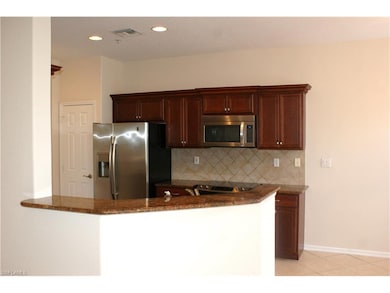 12858 Carrington Cir unit 8-203, Naples, FL 34105 - photo 4