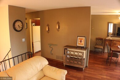 Wall seperates Kitchen from Living Room. Pantry on