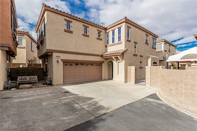 Mediterranean / spanish-style house with a garage,