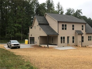 COVERED PORCH AND NICE PATIO FOR GRILLING AND ENTERTAINING
