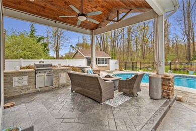 OUTDOOR KITCHEN, STAMPED CONCRETE, HEATED IN-GROUN