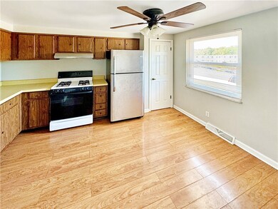 The eat-in kitchen has a pantry.