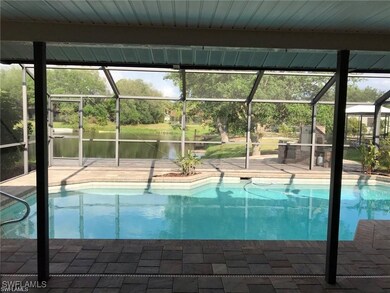 View of swimming pool with a patio area, a water v