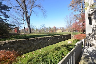Masonry built fieldstone retaining wall... view in distance of Blue Ash Golf course