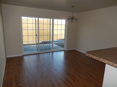 Dining room. Photo of similar home.