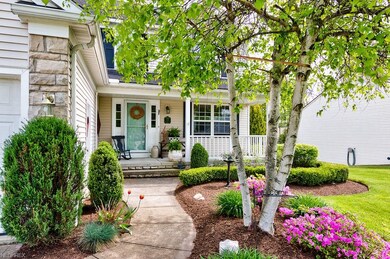 Landscaped walk leads to welcoming front porch