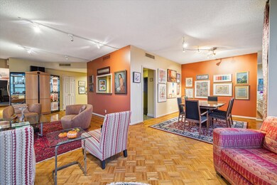 The living area seamlessly flows into the dining r
