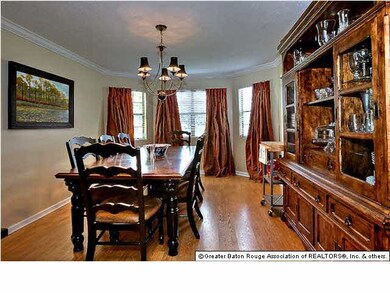 The dining room features a bay window and easily a