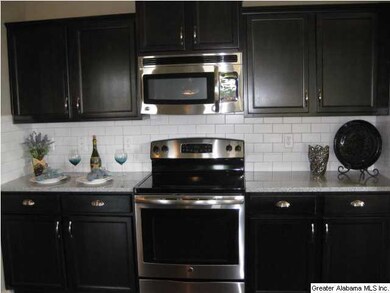 Photo of another home. Close up of kitchen counter