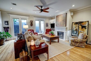 Living Area with gas log fireplace, neutral paint