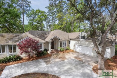 Plenty of parking with 2 car garage with golf cart
