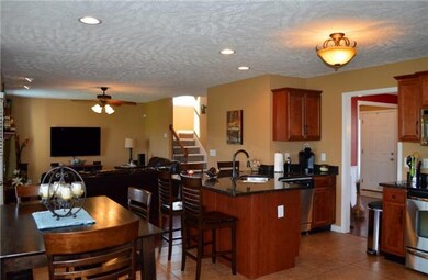 This open floor plan really allows for convenient interactions between rooms!
