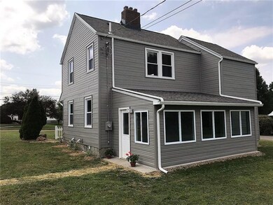 REAR VIEW DISPLAYING 10X19 THREE  SEASON ROOM.