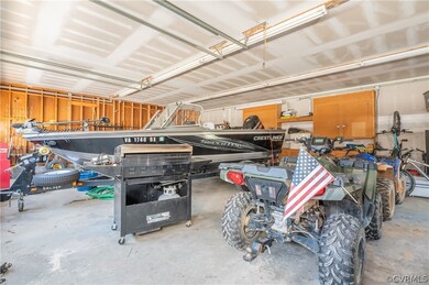 This THREE CAR GARAGE is massive - 40' wide x 28'