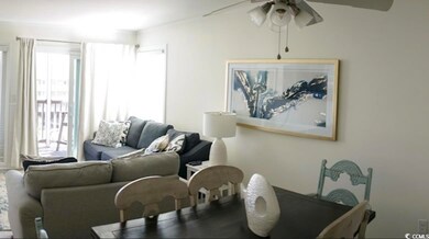 Dining area featuring a ceiling fan