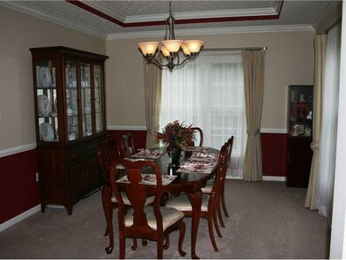 Dining Room. Crown moulding, tray ceiling, chair r