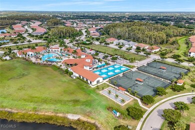 Aerial view of residential area featuring a pool