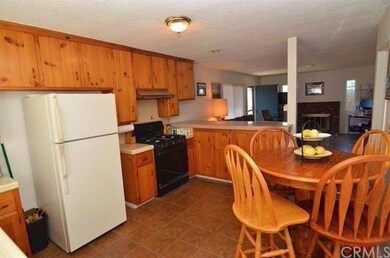 Lots of Cabinet space, Breakfast Bar bordering the