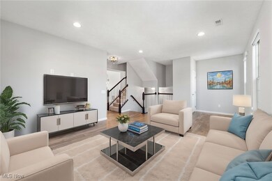  *Virtually Staged Living room with light wood-type flooring