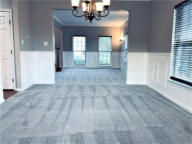 View from dining room to living room with all new 