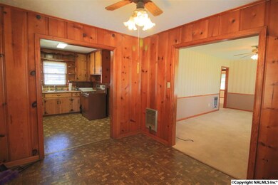 With easy access to the kitchen and the living room.