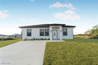 View of front of property featuring a front lawn
