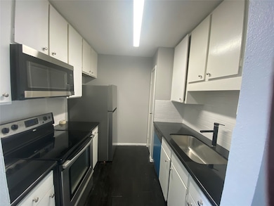 10053 Westpark Dr unit 334, Houston, TX 77042 - photo 4