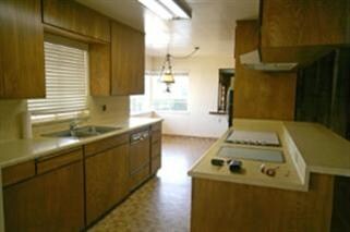 Kitchen w/ double ovens and a refrigerator!