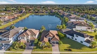 Aerial view of residential area with a large body of water